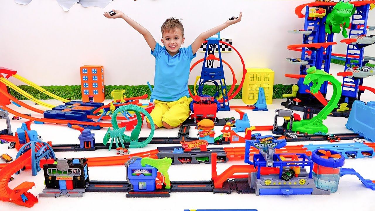 Влад и Ники развлекаются с игрушечными машинками # Hot Wheels City# испытание слаймов