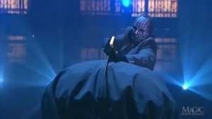 SHES CAGED SHES SAWED AND SHE SURVIVES