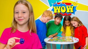 Настя с друзьями играют в гигантскую настольную игру