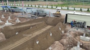 Heavy Machinery at Work!! Filling and Leveling Muddy Foundation Pillars