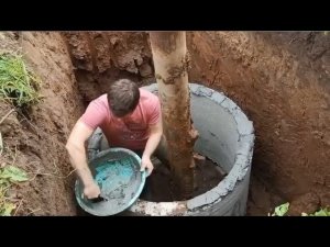 Обустройство скважины кольцами колодезными.