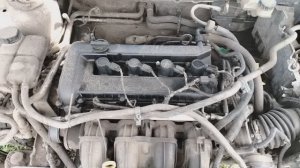 Где находится номер двигателя Ford focus 2  1.8