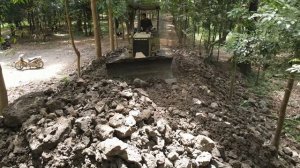 KOMATSU Bulldozer in Action Clearing Massive River Rocks Bulldozer Power Clearing Mud and Rocks from