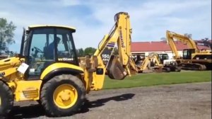 Экскаватор-погрузчик Komatsu WB150