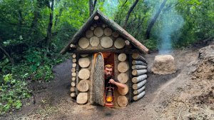 Строительство теплой и уютной глиняной хижины из бревен.