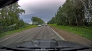 Дорога в переменчивую погоду