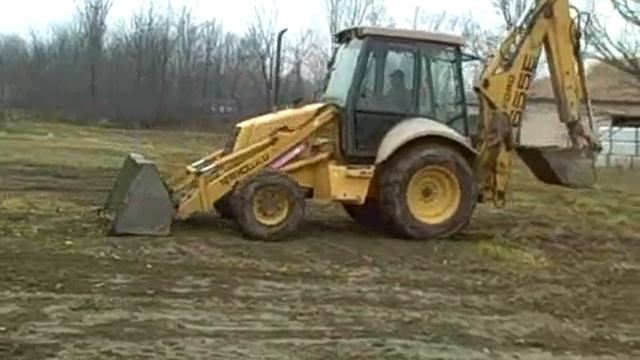 Экскаватор-погрузчик New Holland 655E смотреть онлайн