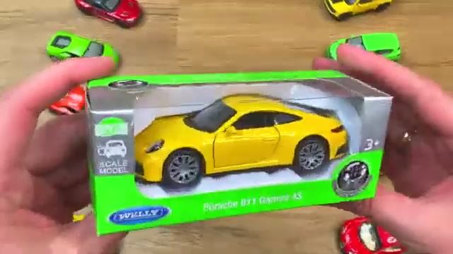 Распаковываем модели машин Porsche 911 и Volkswagen Golf. Мультик про машинки. Машинки для детей смотреть онлайн