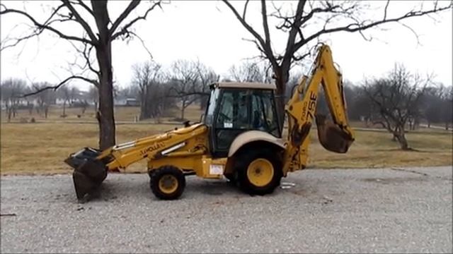 Экскаватор-погрузчик New Holland 675E смотреть онлайн