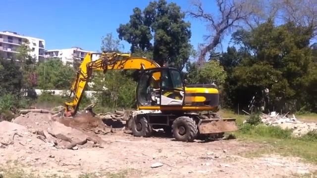 Колесный экскаватор JCB JS 130W смотреть онлайн