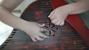 Игра на гуслях