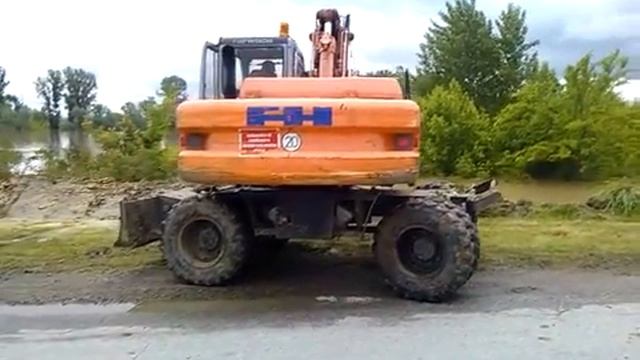 Колесный экскаватор Fiat Hitachi EX 135 W смотреть онлайн