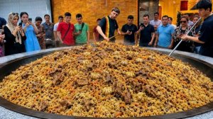 Приготовление гигантского плова с мясом. Знаменитый кабулийский плов. Узбекский плов. Уличная еда