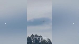 Рыбинск - украинский БПЛА заходит на цель. Его пытаются сбить из автоматов и пулемётов.