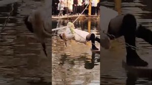 Wet boot and clothers playing float