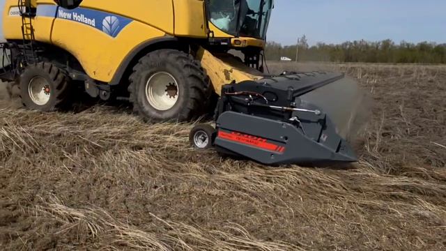 Уборка льна масличного очесывающей жаткой 
