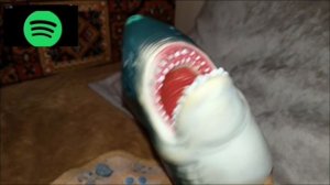 shark puppet tries to sleep