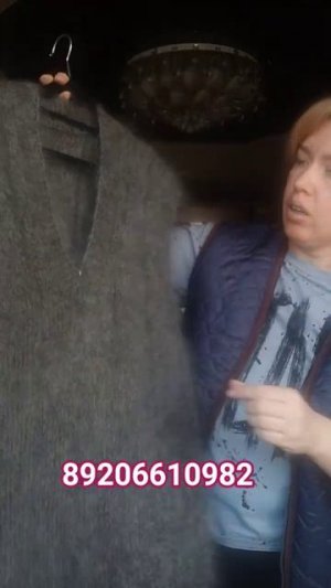 Жилеты пуховые.