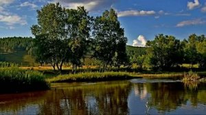 ЗА ТИХОЙ РЕКОЮ.
