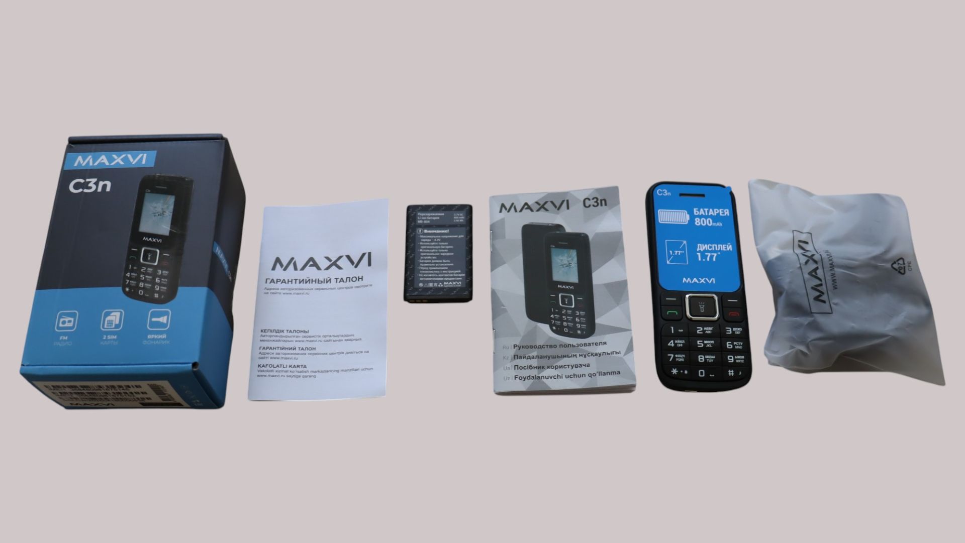 Распаковка и обзор сотового телефона Maxvi C3n