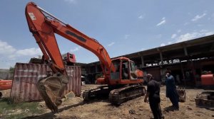 Сборка отслужившего в Китае экскаватора. Пакистан