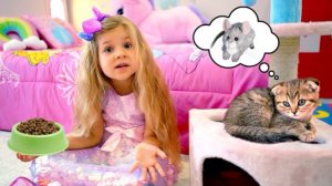 Диана учится ухаживать за котёнком