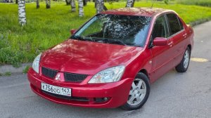 Mitsubishi Lancer IX рестайлинг 2006г 1,6л ат красный - мини обзор