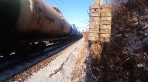 Электровоз 3ЭС5К-721 «Ермак» с грузовым поездом на зимнем Транссибе.