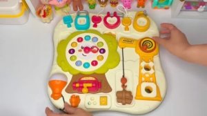 Распаковка игрушек. Играем в игрушку с часами. Интересный и увлекательный мультик для детей и малыше