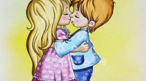 Мальчик и девочка целуются.