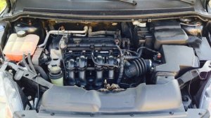 Где находится датчик коленвала Ford focus 2 1.8