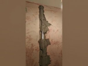 Подготовка к штукатурке. Установка второго основного маяка для штукатурки стены смесью Unis теплон.