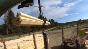 Загрузка доски в Камаз манипулятором Атлант С-90 ЭКШЕН
