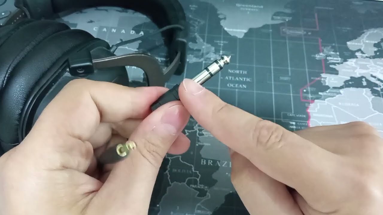 Если проблема с переходником 4pin Jack 3.5 на 6.3 в звуковую карту