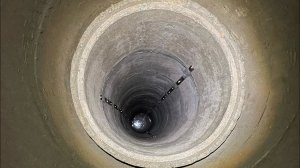 Углубление колодца после бурения машиной