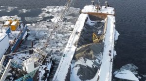 Заливка тампонажного слоя бетона на опоре №19. строительство моста через Волгу Тольятти.