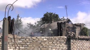 Поселок Октябрьский в Донецке после обстрела. 29.06