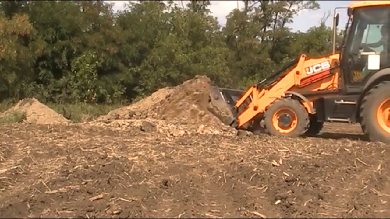 JCB 3CX Как управлять передним ковшом и челюстью. JCB 3CX Front shovel and jaw. смотреть онлайн