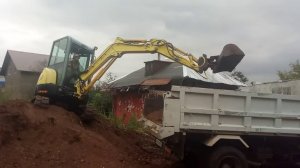 Планировка участка мини экскаватором Yanmar VIO