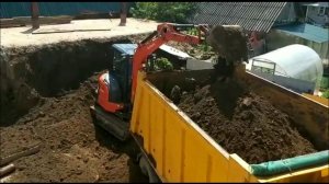 Сможет ли мини экскаватор загрузить самосвал