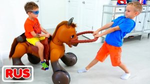 Влад и Никита катаются на игрушечном мотоцикле