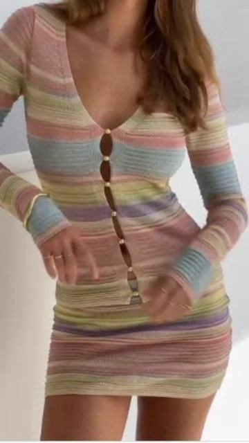 A girl in a pastel knitted beach outfit