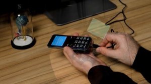 Panasonic KX-TU150: простой мобильный телефон с крупными кнопками и функцией SOS