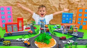 Влад и Ники играют с детскими машинками и строят Matchbox City