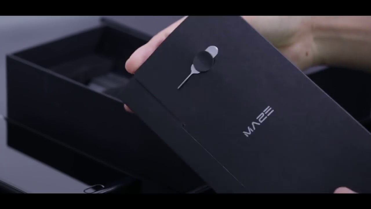 Распаковка Maze Comet - прочного смартфона с кожаной задней крышкой из телячьей кожи смотреть онлайн