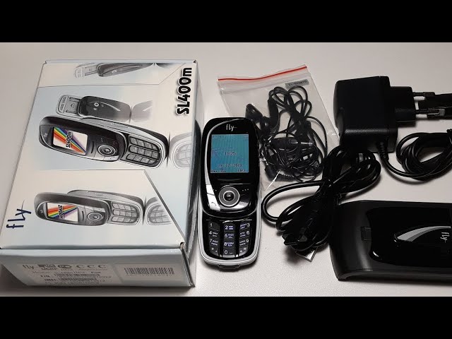 богатая комплектация телефона Fly SL400m. 2006 года