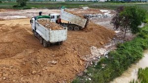 Pushes During Rain PowerFul Bulldozer DH17C2 Pushes Processing Landfill Pour Soil into Flooded Land