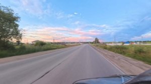 Неспешная мотопрогулка по городу под невероятно красивым небом