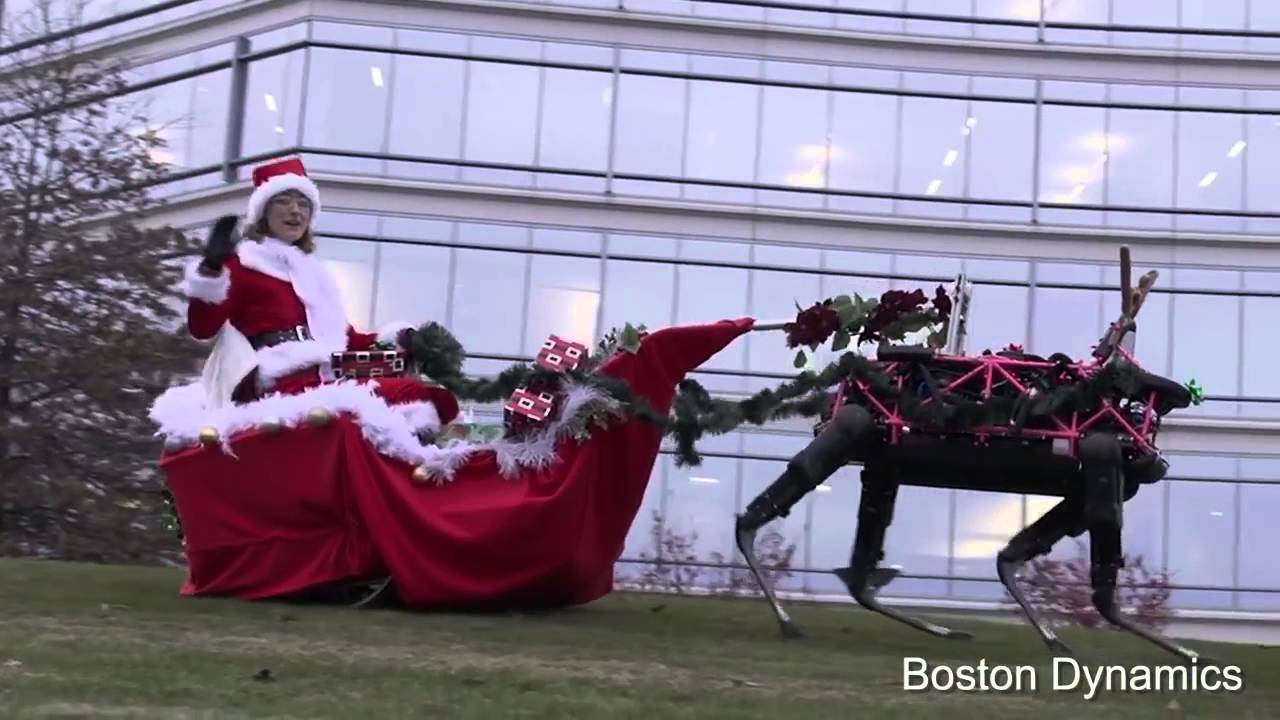 Boston Dynamics запрягла в сани Санты роботов Spot смотреть онлайн