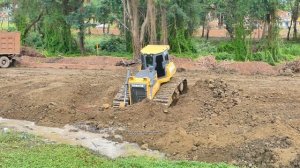 Helping SHANTUI Bulldozer Assistant For Road Clearing Work Hard On A Road Construction Site